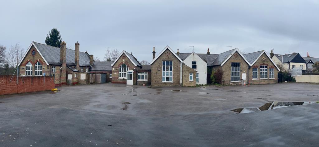 Lot: 5 - FORMER SCHOOL ON ONE ACRE SITE INCLUDING PLAYGROUND AND CAR PARK WITH POTENTIAL - Panoramic view of rear of premises